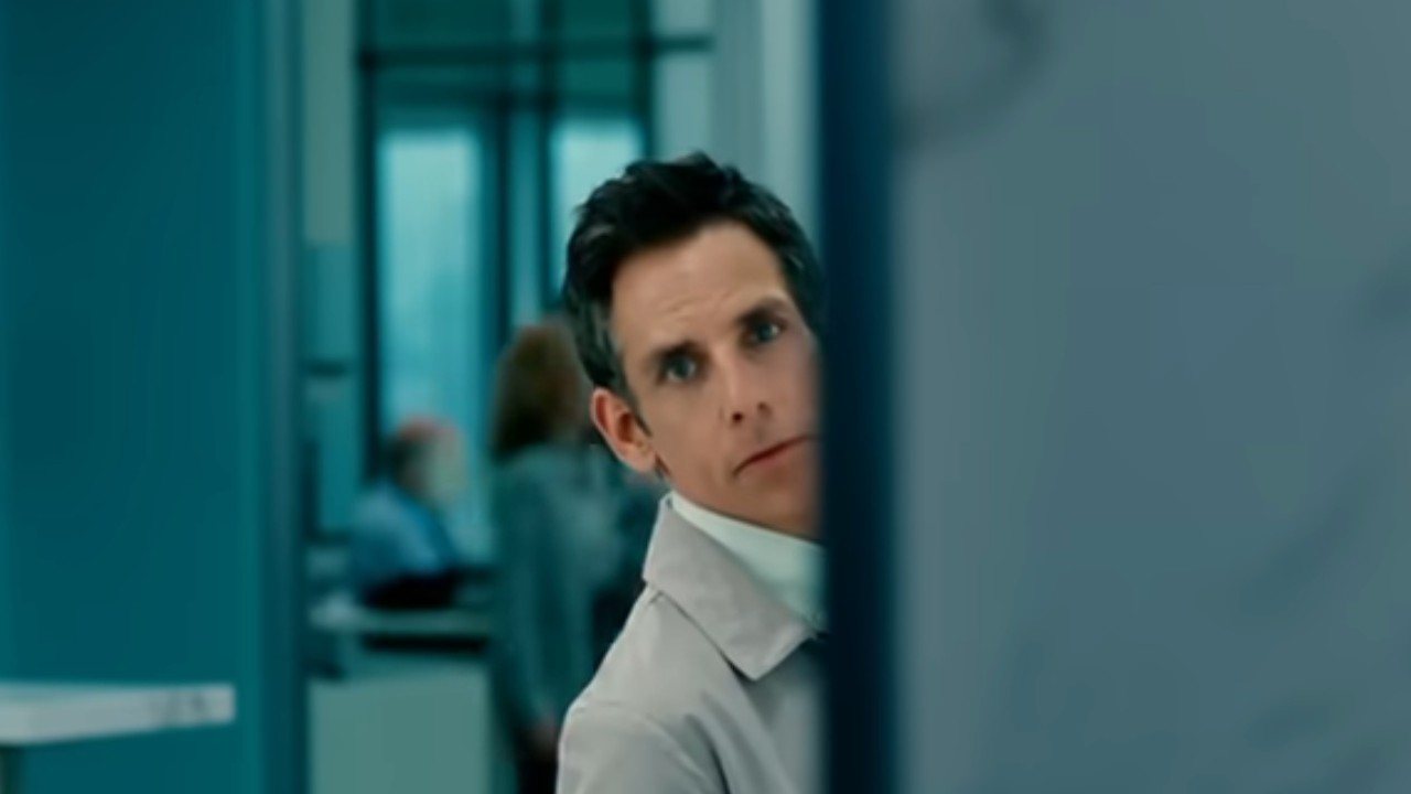 Ben Stiller poking his head around a wall in The Secret Life of Walter Mitty