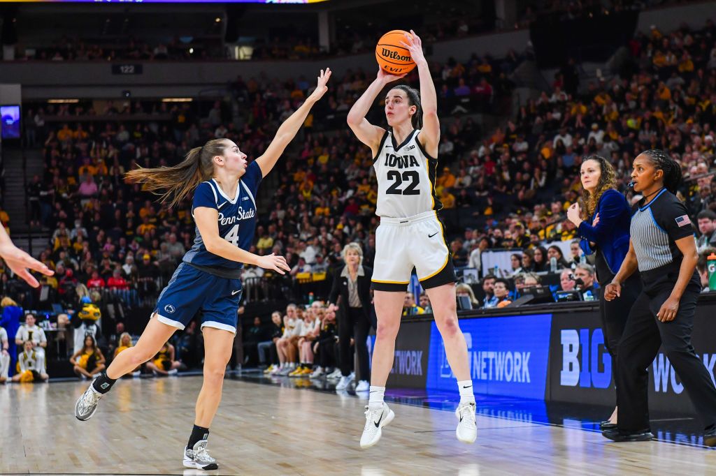 Caitlin Clark #22 of the Iowa Hawkeyes attempts a shot over Shay Ciezki #4 of the Penn State Lady Lions during the first half of a Big Ten Women&#039;s Basketball Tournament quarter finals game