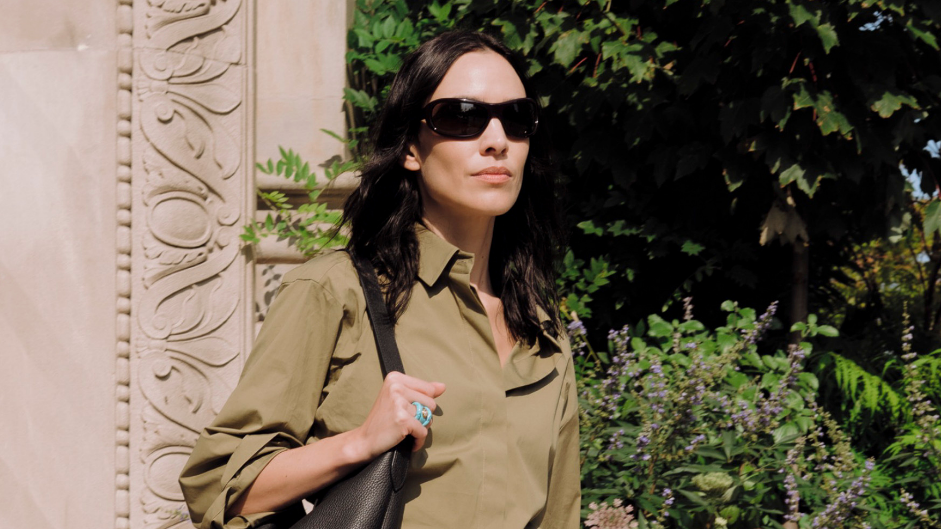 Alexa Chung spotted on the Lower East Side in New York City wearing mid-length shorts. 