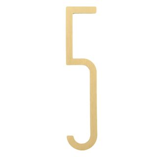 A gold door number