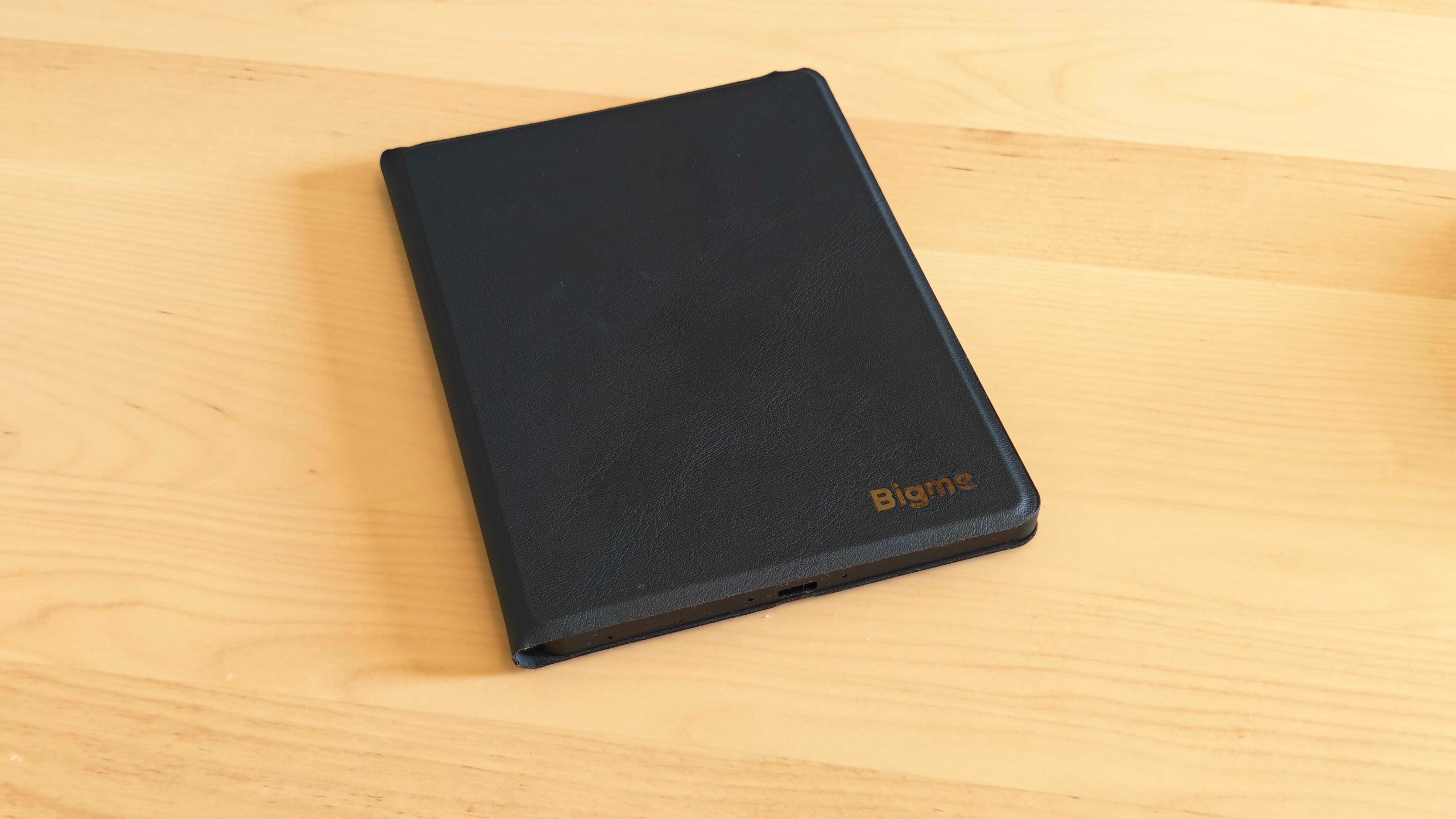 The Bigme B6 Color e-reader on a clean desk surface.
