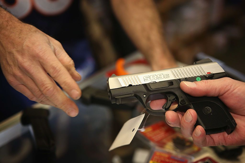 A customer shopping for a pistol