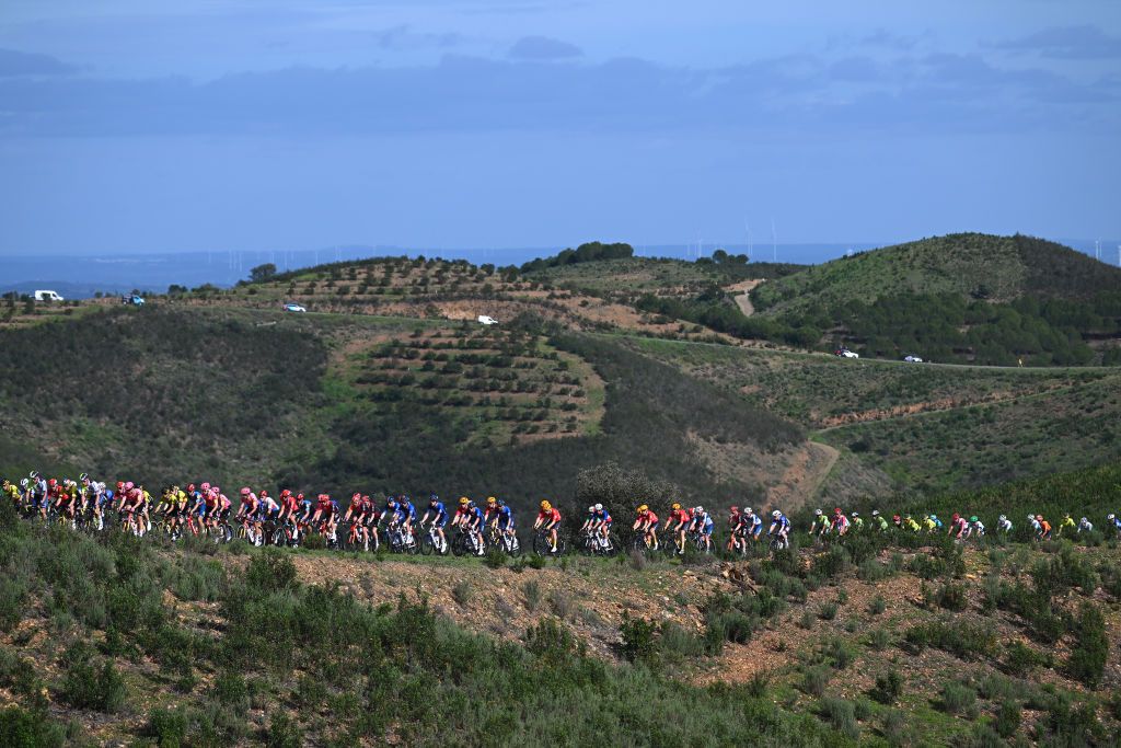 TAVIRA PORTUGAL FEBRUARY 16 A general view of the peloton climbing to the Alcaria 320m during the 50th Volta ao Algarve em Bicicleta 2024 Stage 3 a 1922km stage from Vila Real de Santo Antonio to Tavira on February 16 2024 in Tavira Portugal Photo by Dario BelingheriGetty Images