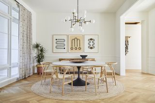 minimalist dining room with large round dining table