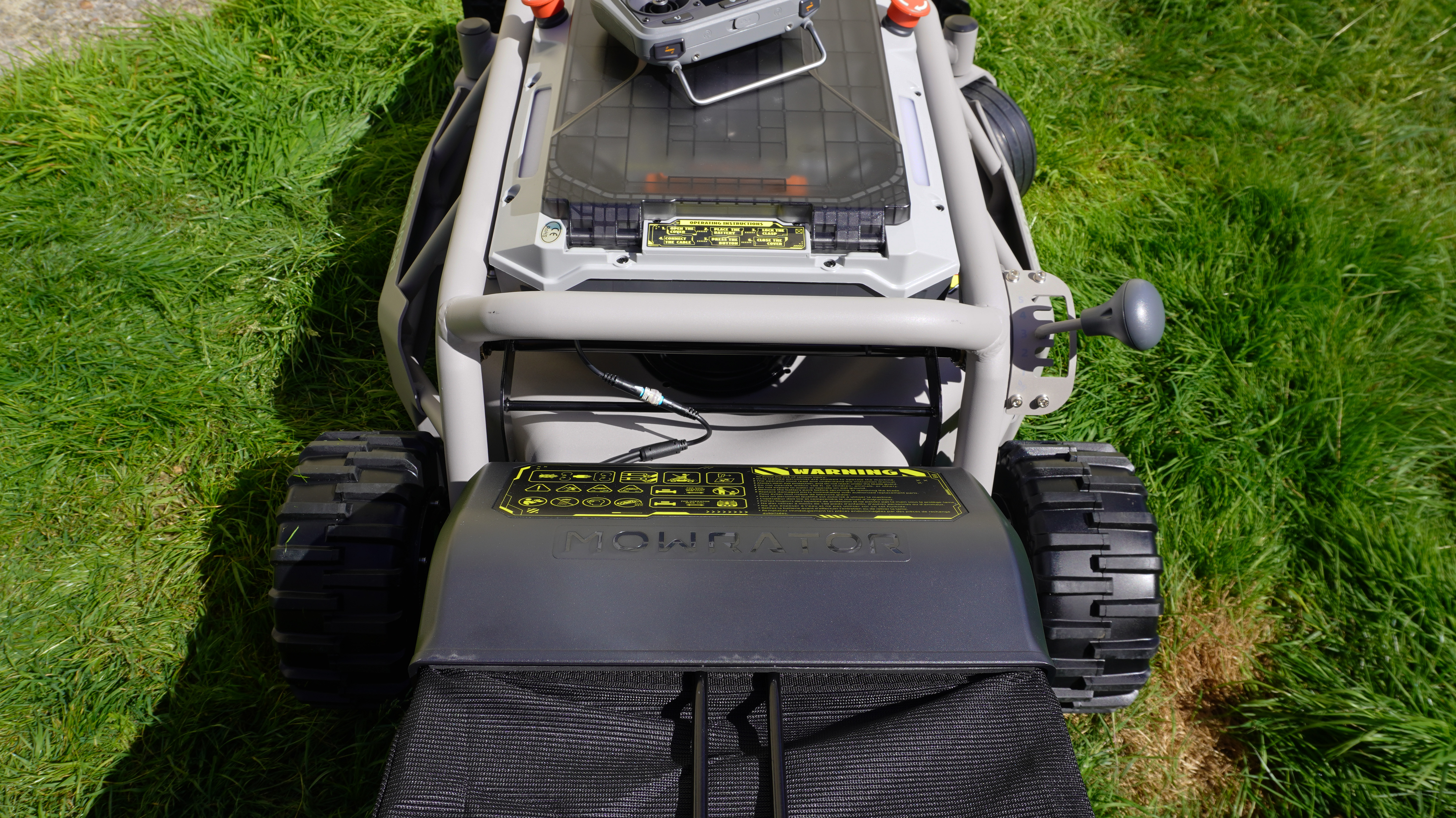 Mowrator S1 2WD lawnmower photographed on green grass.