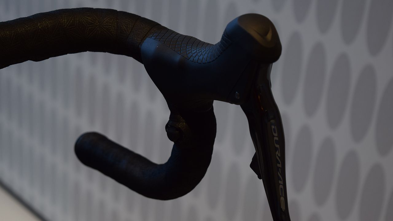 Gilbert runs satellite Di2 sprint shifters on his handlebar drops for easy shifting on the cobbles