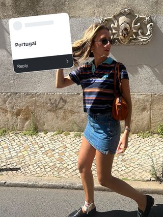 woman wearing polo shirt and denim skirt in portugal