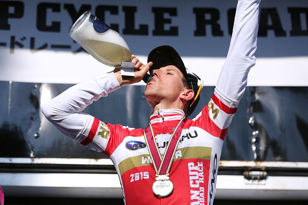 Bauke Mollema takes a swig of the celebratory bubbly
