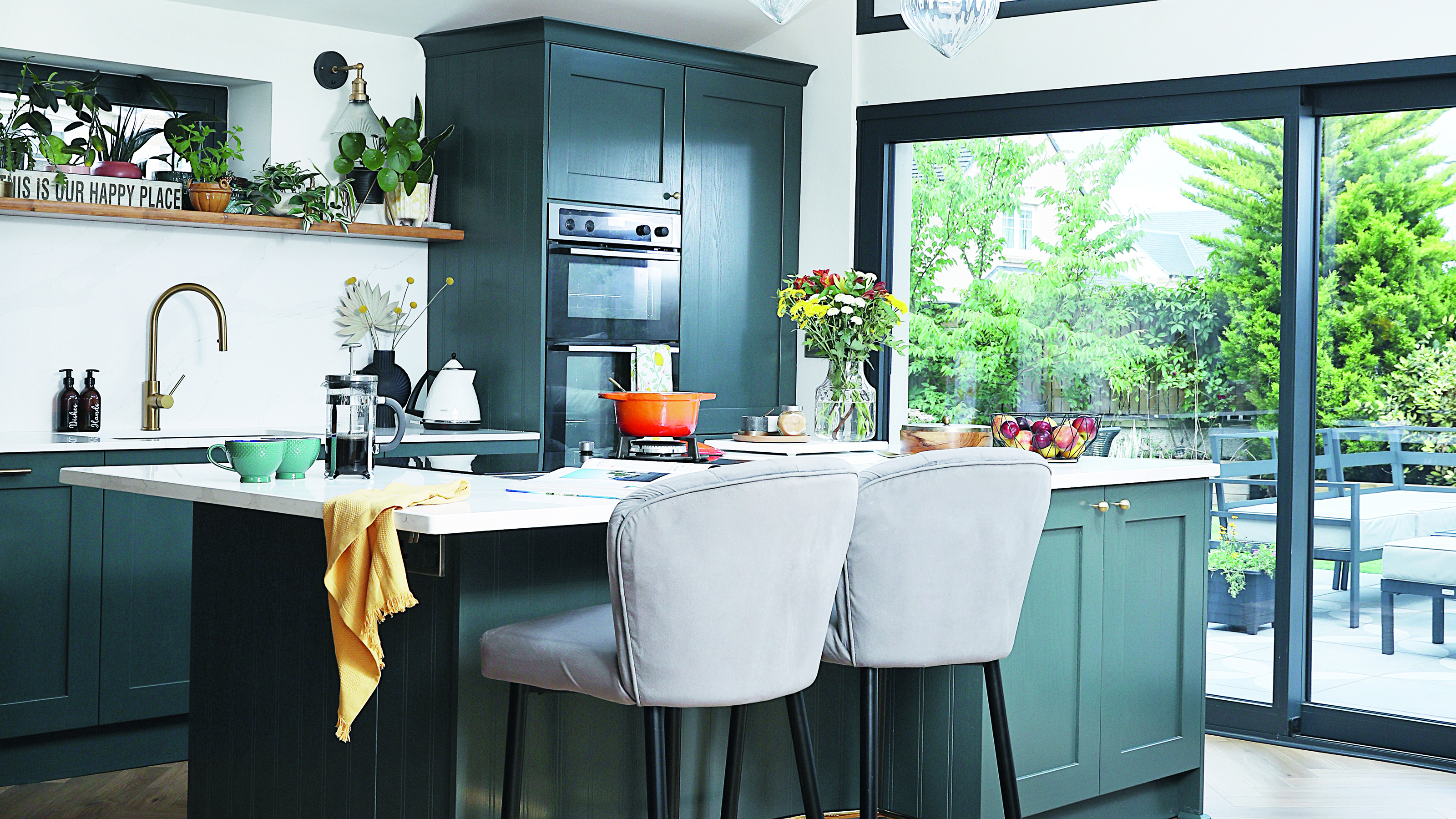 Double oven in green kitchen