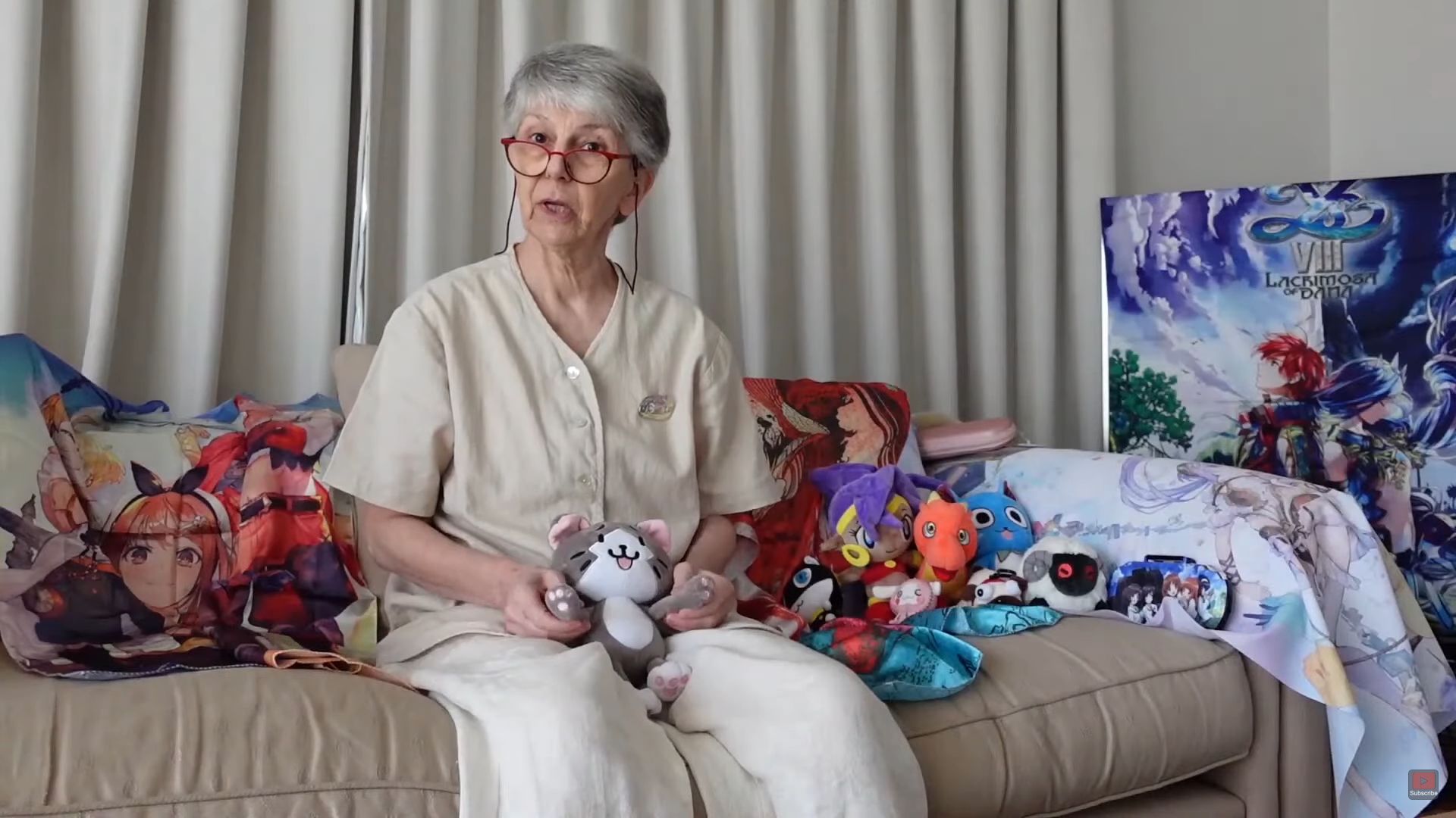 Dame Britta, surrounded by her anime merchandise