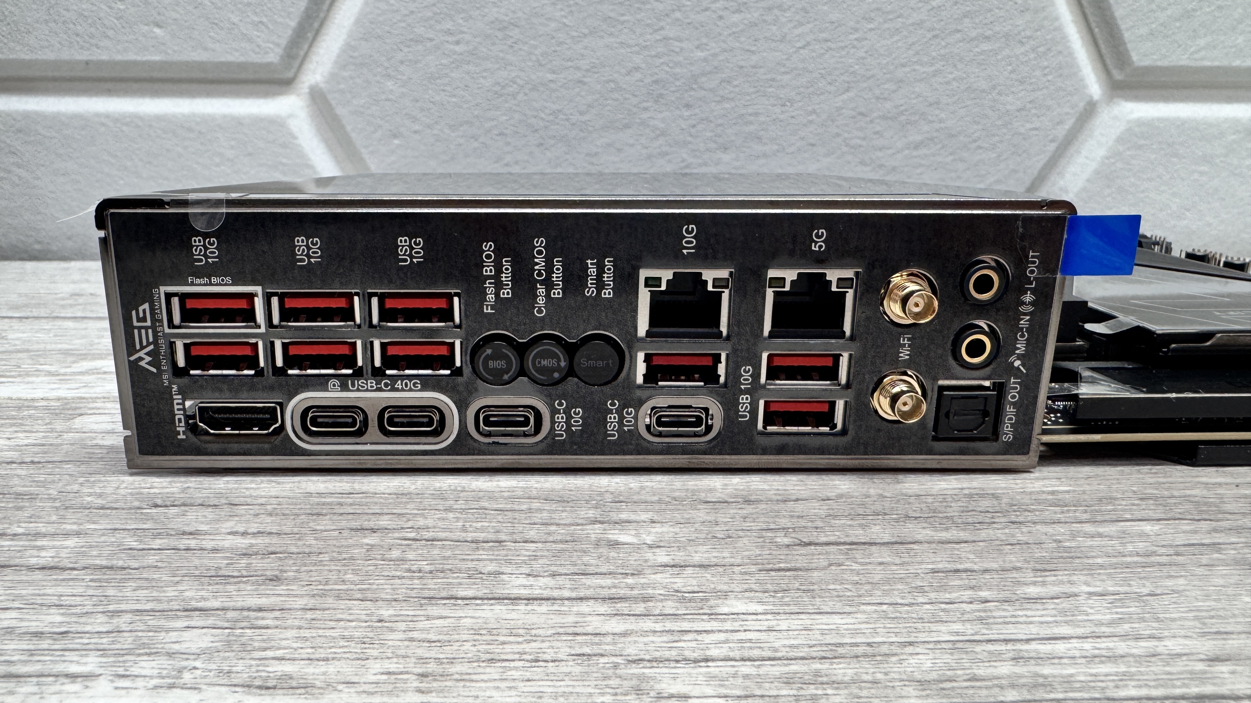 An MSI MEG X870E Ace Max motherboard on a desk.