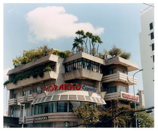 A Vietnamese modernist building in District 3 houses local cosmetics brands Thorakao and a branch of Starbucks. Vietnam is the second largest coffee exporter in the world, but the Seattle-based chain accounts for only a meagre share of the local coffee-drinking market