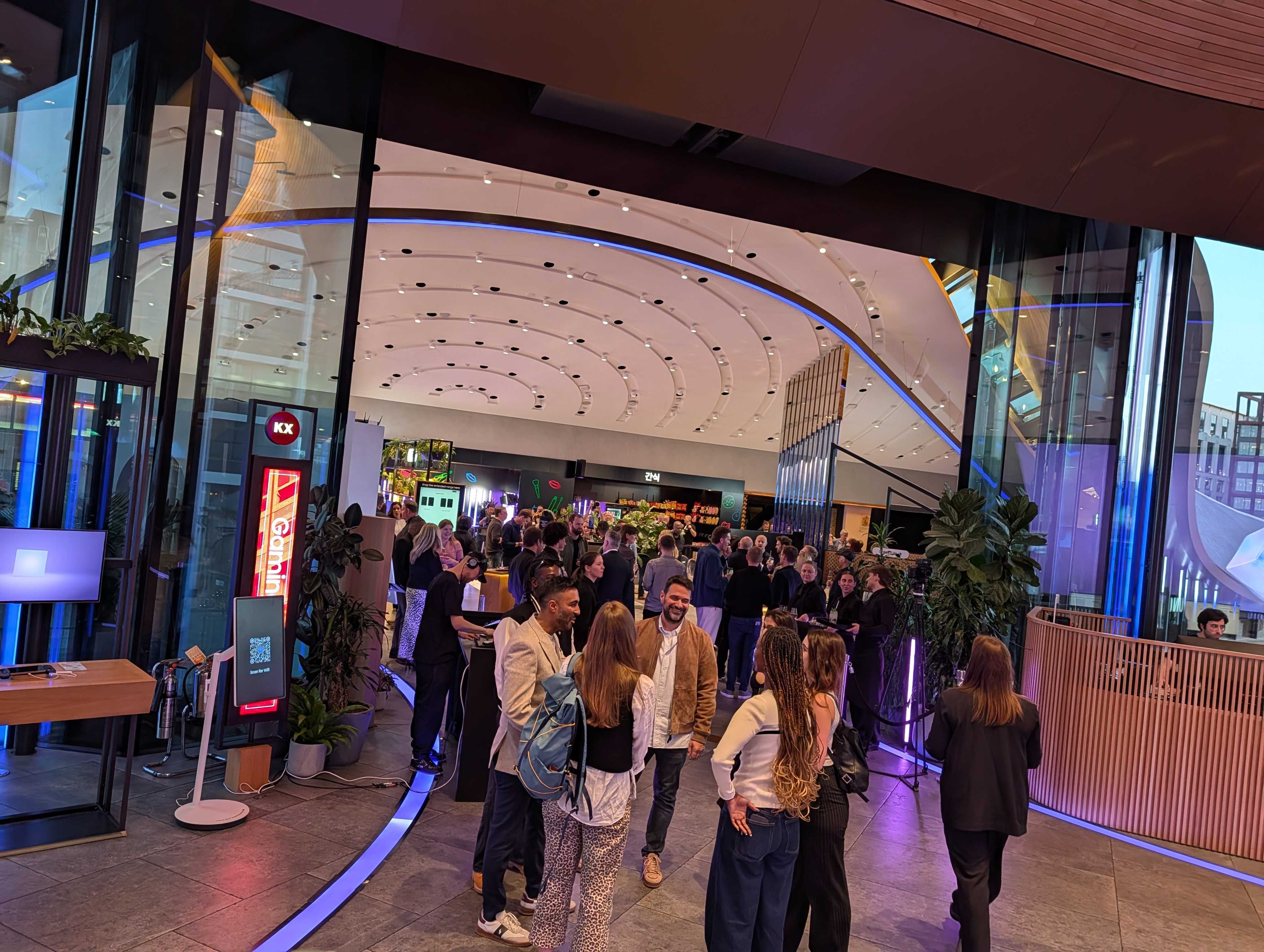 People mingling at the Samsung Galaxy Unpacked 2026 event in London, England.