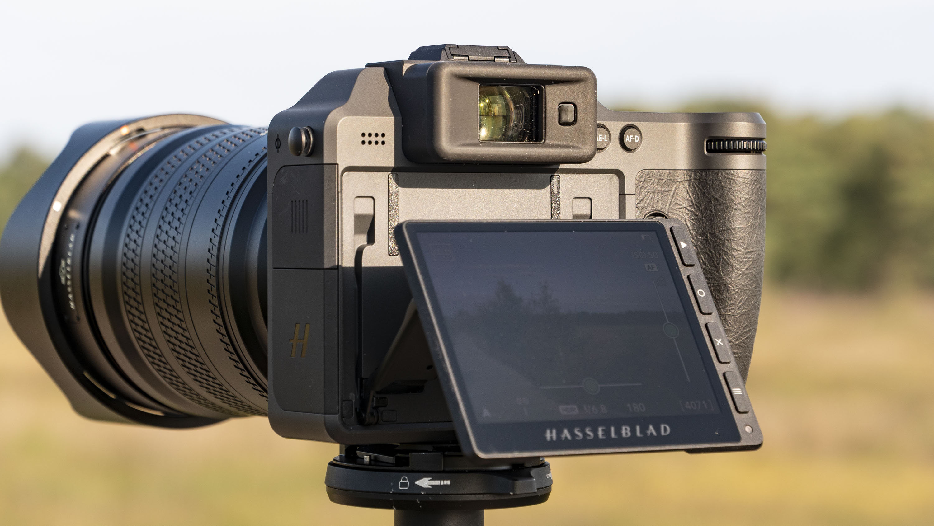 Hasselblad X2D II 100C camera outdoors at first light, with its touchscreen tilted