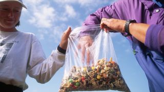 Hikers sharing a bag of trail mix