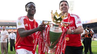 Bukayo Saka and Mikel Arteta of Arsenal lift the Premier League Trophy after the Premier League match between Crystal Palace FC and Arsenal at Selhurst Park on May 24, 2026 in London, England