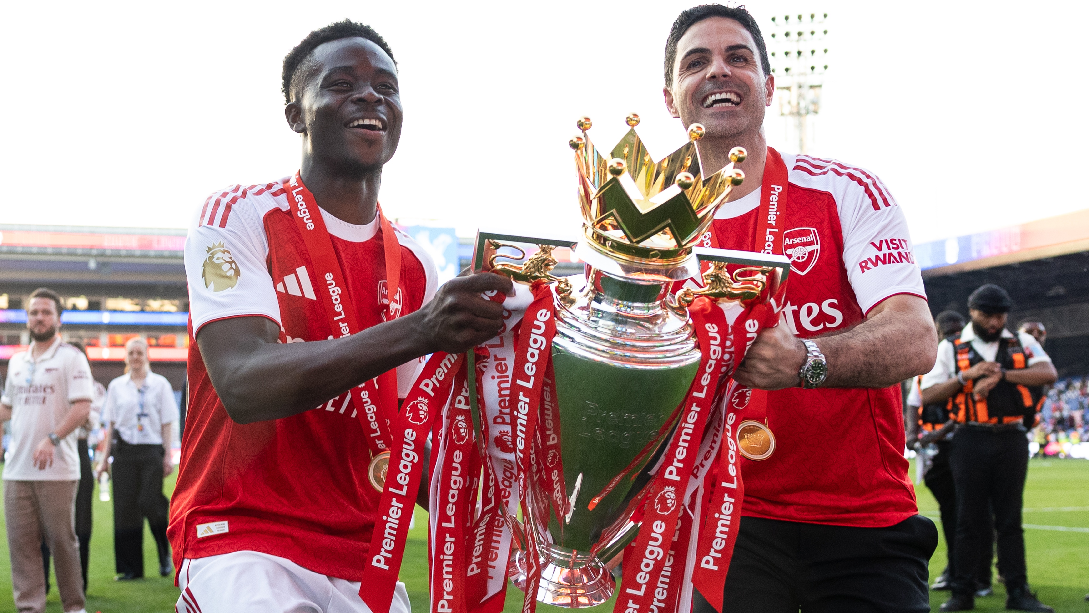 Bukayo Saka and Mikel Arteta of Arsenal lift the Premier League Trophy after the Premier League match between Crystal Palace FC and Arsenal at Selhurst Park on May 24, 2026 in London, England