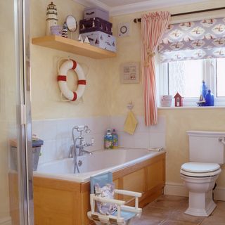bathroom with bathtub and western commode