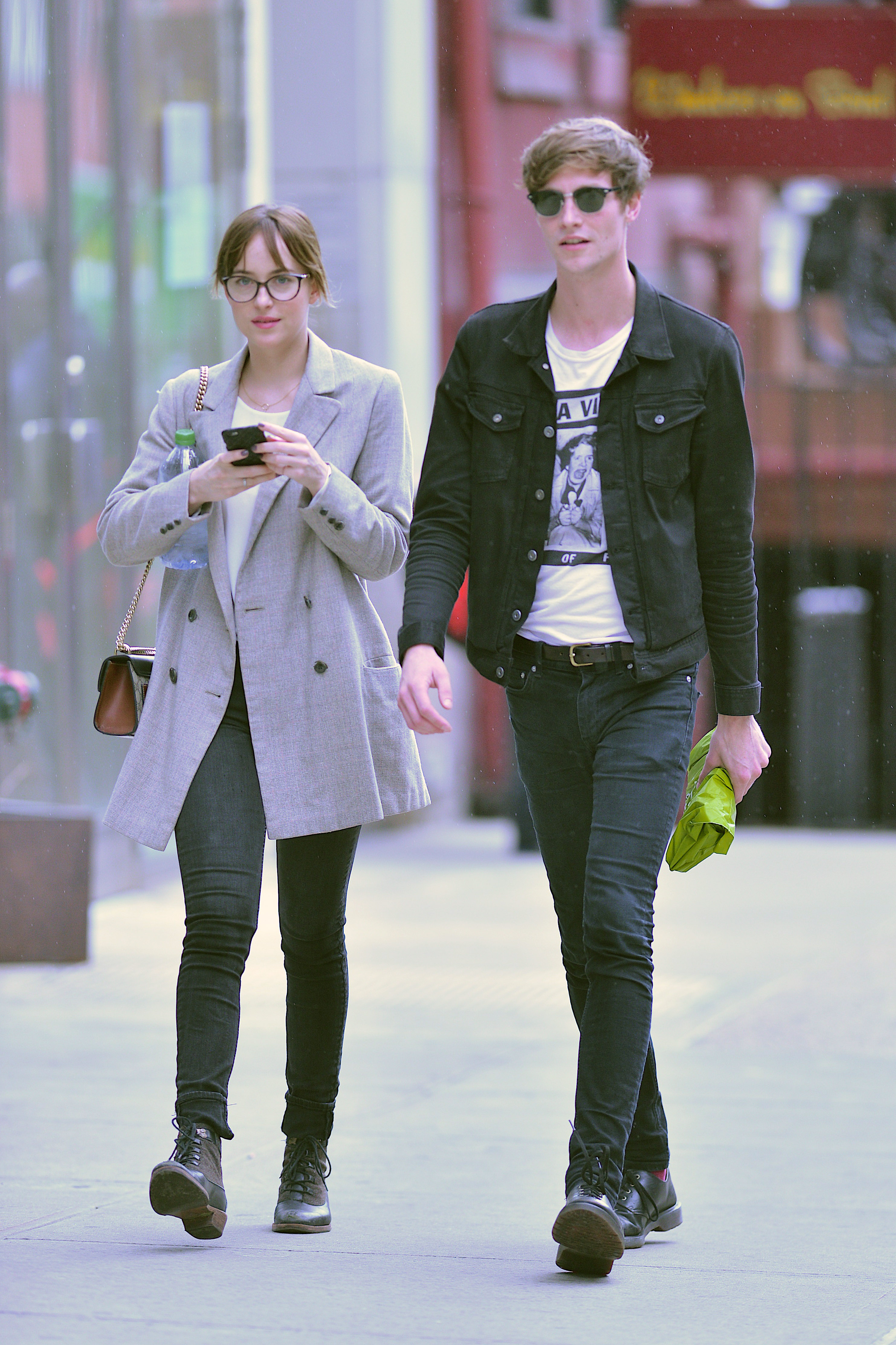 Dakota Johnson and Matthew Hitt seen in NoHo on October 9, 2015 in New York City. (Photo by Robert Kamau/GC Images)
