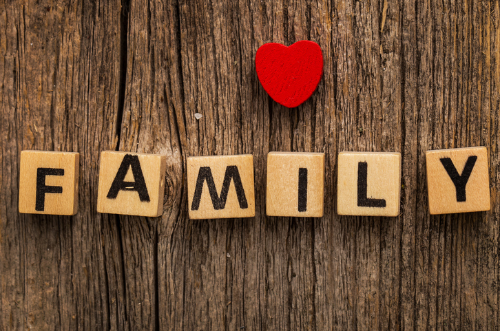 Tiles that spell "family."
