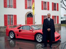 Lewis Hamilton in Maranello alongside a Ferrari F40 