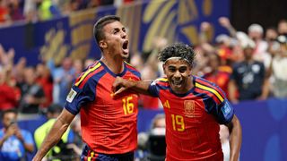 ATLANTA, GEORGIA - JUNE 21: Lamine Yamal #19 of Spain celebrates with teammate Rodri #16 after scoring his team's first goal during the FIFA World Cup 2026 Group H match between Spain and Saudi Arabia at Atlanta Stadium on June 21, 2026 in Atlanta, Georgia. (Photo by Patrick Smith - FIFA/FIFA via Getty Images)