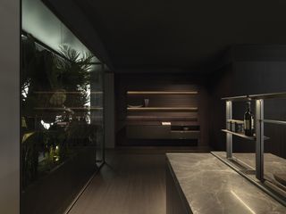 On the third floor, a wall of greenery separates the multifunctional and modular Sistema XY kitchen by Francesco Meda from the living areas nearby