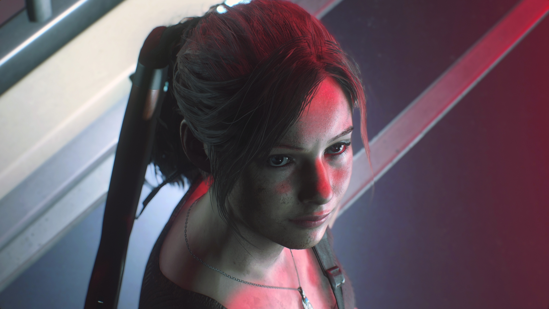 Claire looks upwards toward the camera in Resident Evil 2