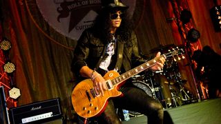 Best rock guitars: Slash live in concert with a Gibson Les Paul