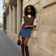 Emmanuelle in blue and brown outfit