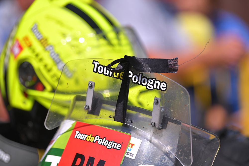 Riders, staff and event organisers at the Tour de Pologne wear black ribbons out of respect for Bjorg Lambrecht who died in an accident during stage 3