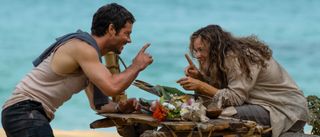 Dylan O'Brien and Rachel McAdams across a makeshift table together in Send Help