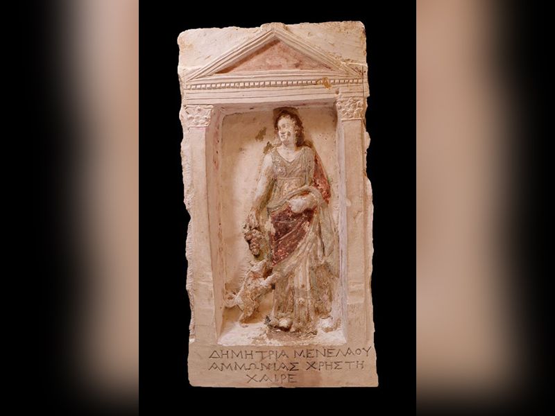 A carving found inside an ancient Egyptian catacomb has a Greek inscription that reads: "Demetria daughter of Menelaos, granddaughter of Ammonia, worthy, farewell."