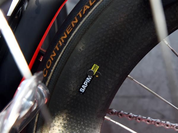HTC-Highroad team mechanics glued a small magnet right on the sidewall of Mark Cavendish's Zipp 808 rear wheel.