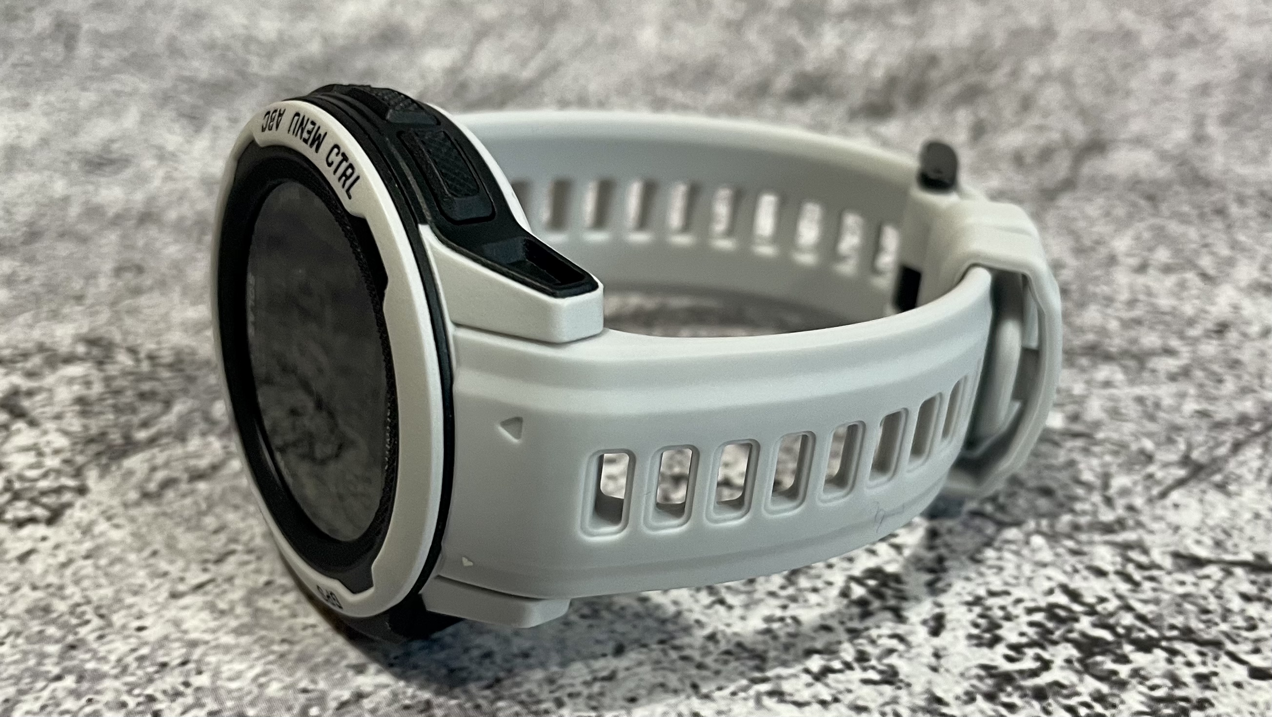 Garmin Instinct 2 with white case and band