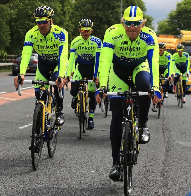 Oleg Tinkov leads the Tinkoff-Saxo riders out on their training run