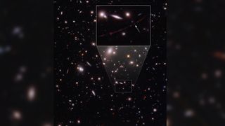 The most distant star yet seen, called Earendel, is indicated by an arrow in the inset of this image from the Hubble Space Telescope that captured the star from 12.9 billion light-years away using a gravitational lens.