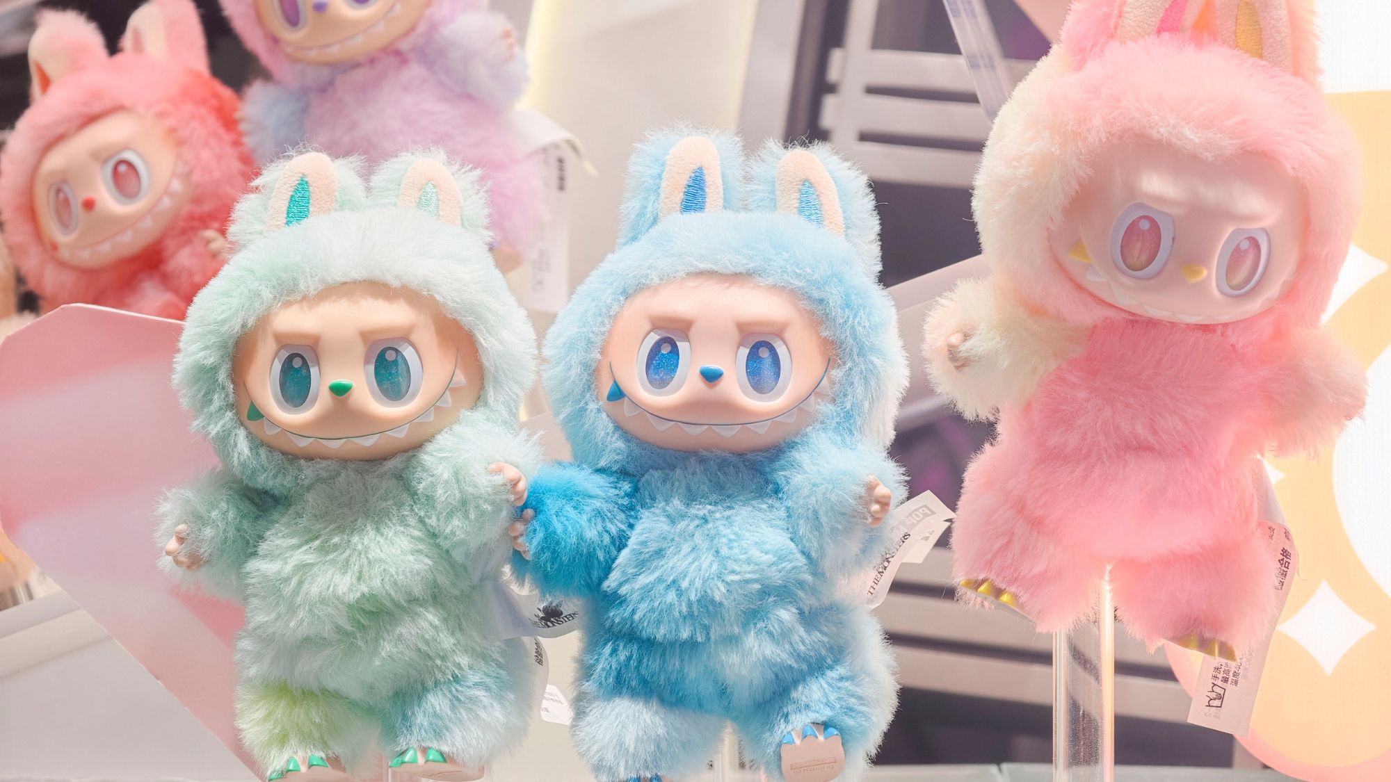 Pop Mart's Labubu vinyl plush figures on display at a Pop Mart shop