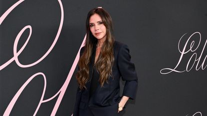 Victoria Beckham at the premiere of "Lola" held at the Regency Bruin Theatre on February 3, 2024 in Los Angeles, California in a black suit.