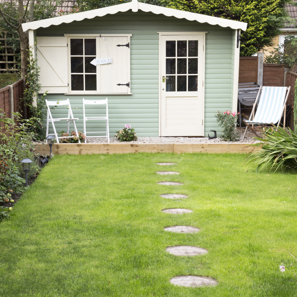 stepping stone with pathway and white door