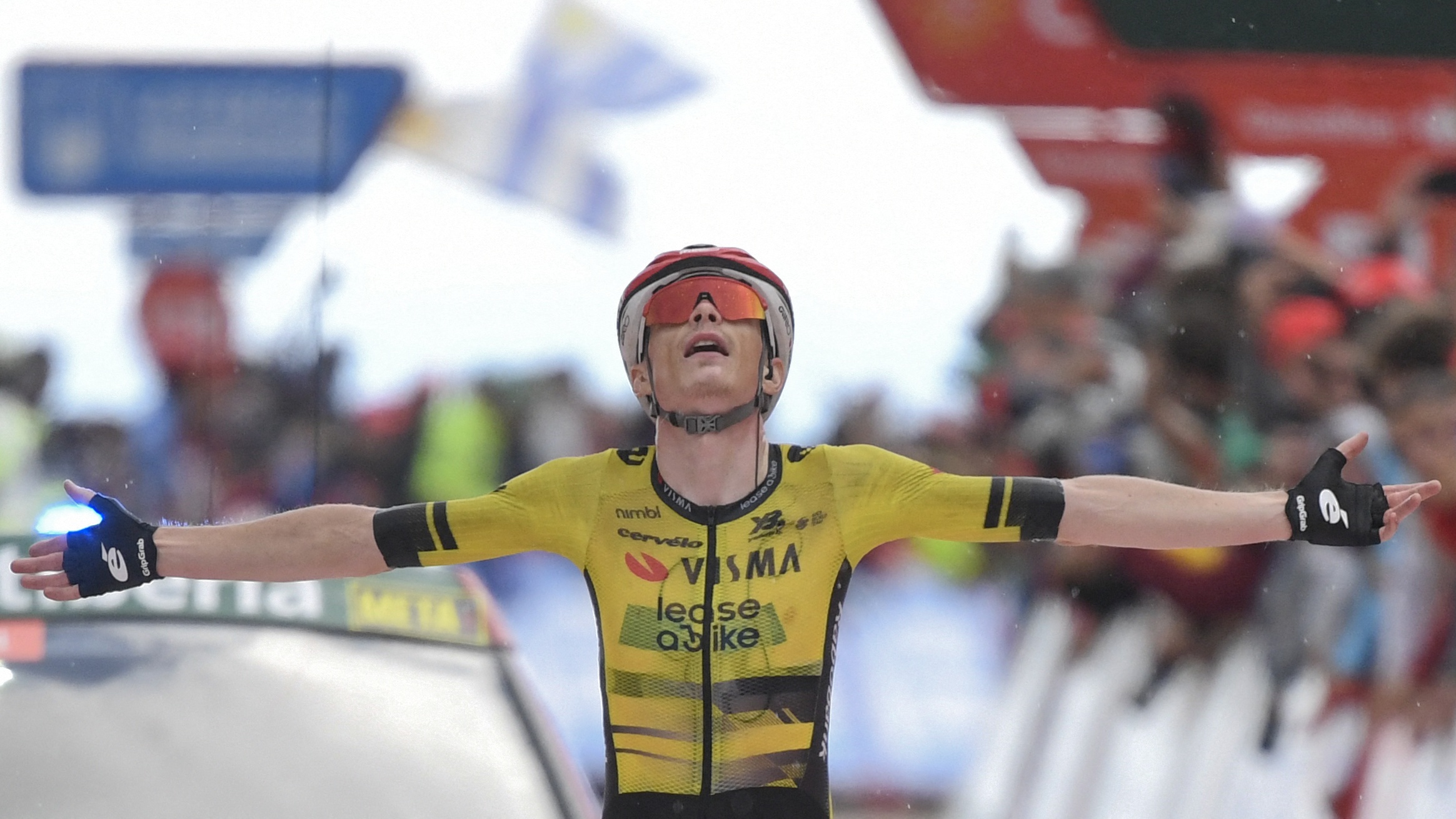 Team Visma-Lease a bike's Danish rider Jonas Vingegaard celebrates crossing first the finish line of the 9th stage of the Vuelta a Espana, a 195 km race between Alfaro and Valdezcaray, on August 31, 2025. (Photo by ANDER GILLENEA / AFP) (Photo by ANDER GILLENEA/AFP via Getty Images)