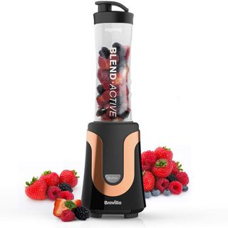 black blender and smoothie maker with strawberries