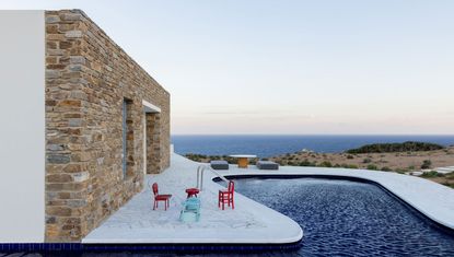 Peninsula House in Antiparos, Greek islands, with swimming pool, white volumes and colourful furniture