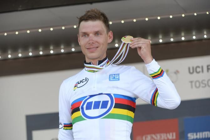 Tony Martin (Germany) shows off his hardware after winning the time trial world championship for the third straight year