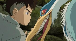 Mahito Maki (Luca Padovan) and the Gray Heron (Robert Pattinson) in The Boy and the Heron