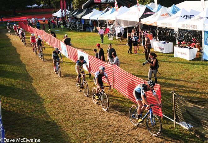 Jamey Driscoll (Raleigh Clement) leads on lap one through the vendor zone