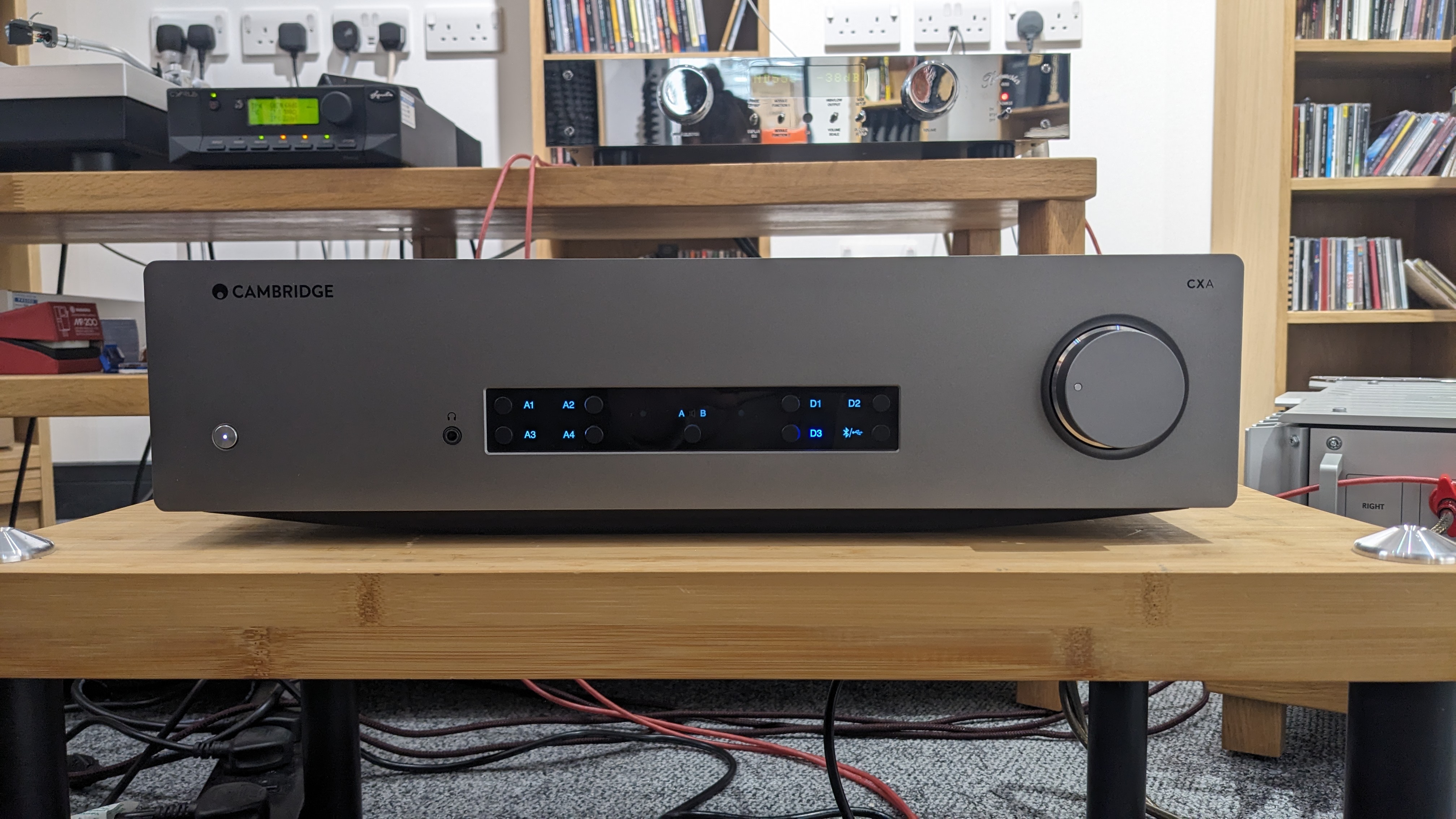Cambridge Audio CXA81 MkII stereo amp on wooden rack in hi-fi test room