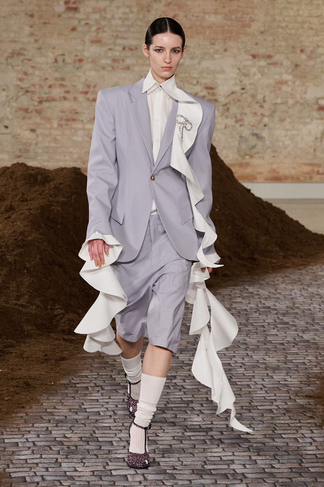 A model wore Zendaya's bermuda shorts on the Moschino Fall 2026 runway