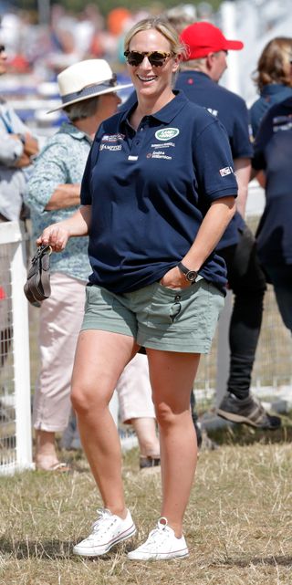 Zara Tindall wearing white Converse trainers