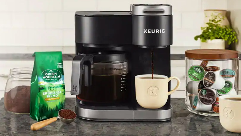 The Keurig K-Duo coffee maker being used in a kitchen
